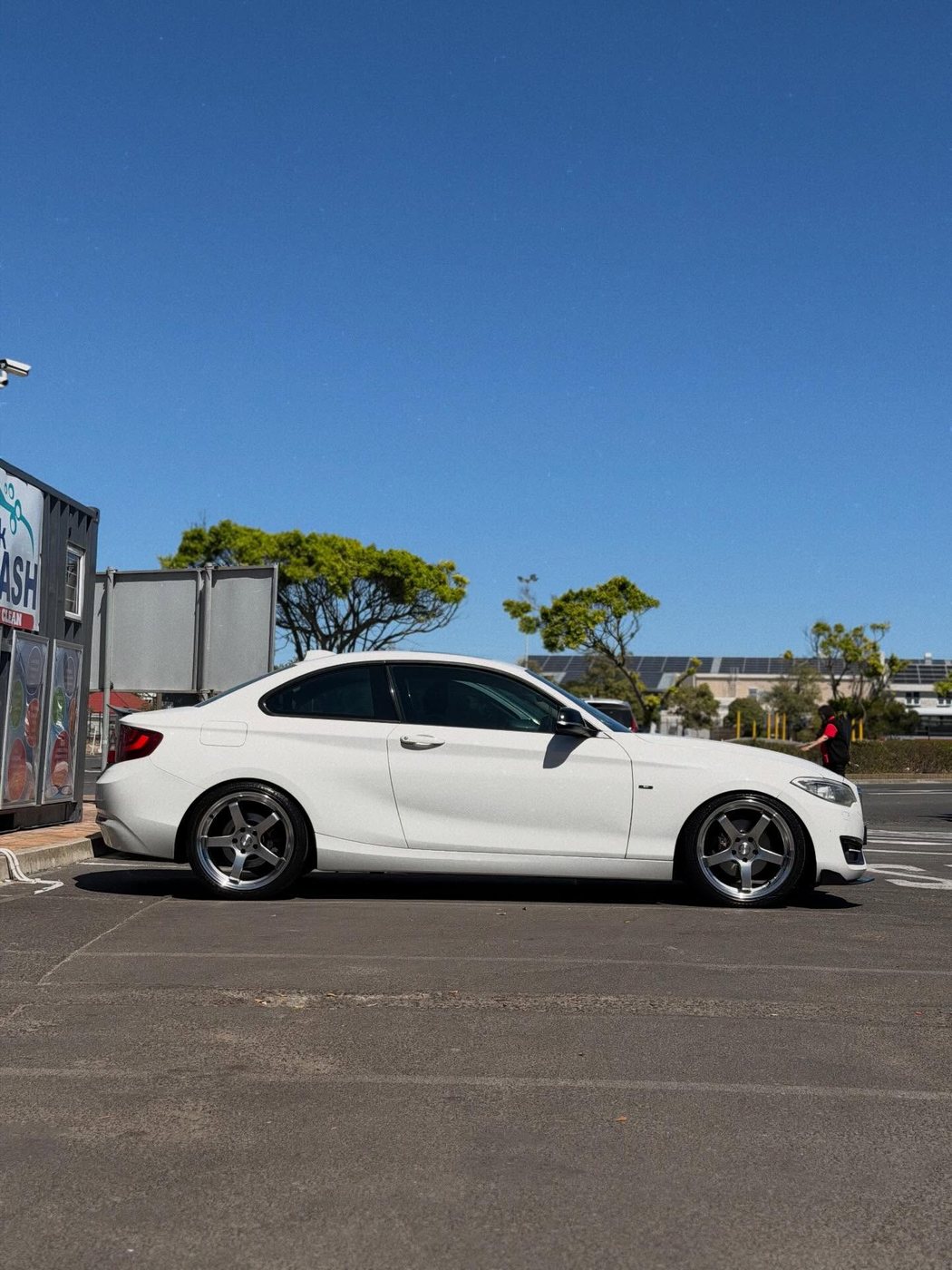 White coupe photographed outdoors